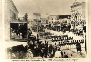 Photograph of Chickasaw Guard marching up Congress Avenue toward Capitol