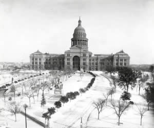Photograph showing the snow-covered south grounds of the Capitol Building