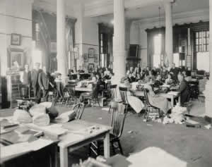Photograph of typists seated at typewriters