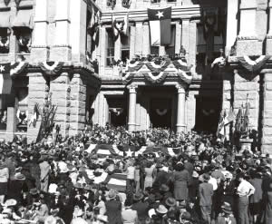 Photograph of Governor Jester making his inauguration speech on the steps of the Capitol Building.