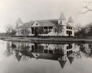 Photograph of pavilion reflected in lake