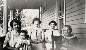 Photograph of Herber Family seated on porch