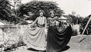 Photograph of young women showing their vintage clothing