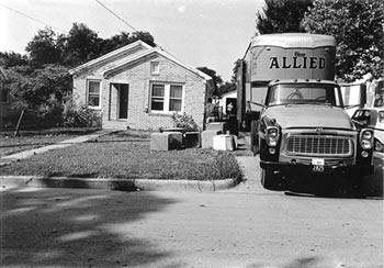 Photo of home and moving van