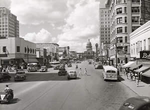 Photograph of a busy Congress Avenue circa late 1940s