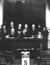 Photograph of Governor Hobby signing the full suffrage bill on February 5, 1919