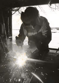 Photograph of ironworker in protective gear